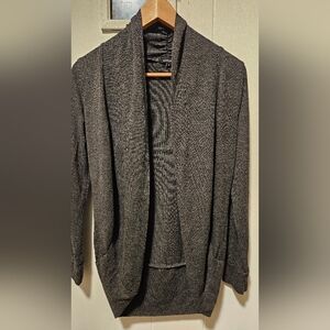 Pre-owned Ambiance cardigan, small, black in color, made in Cambodia.
